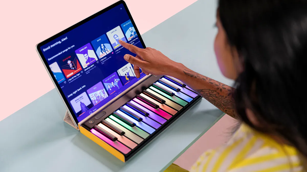 Want A keyboard that lights up keys according to a music-score via USB?